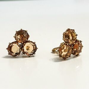 Vintage Monet clear amber colored glass bead clip on earrings.
